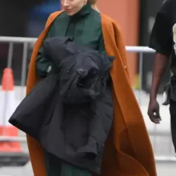 Anatomy of a Scandal Sophie Whitehouse Orange Coat